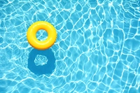 A flotation device floats in a pool